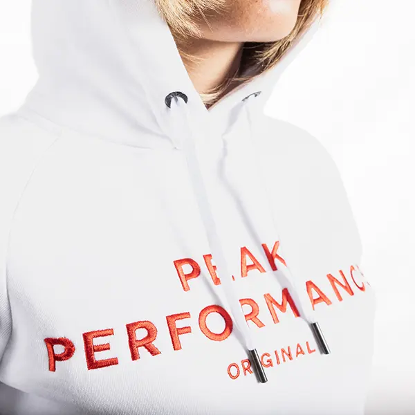 White Peak Performance sweatshirt with red logo